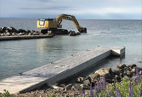 excavator digging rock