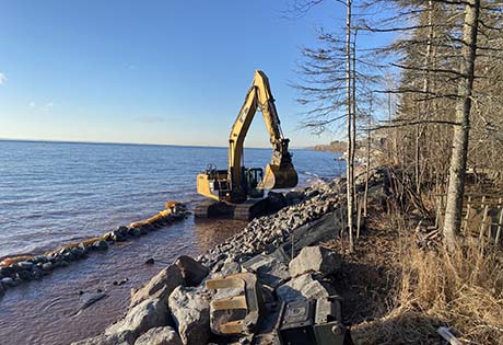 excavator in water